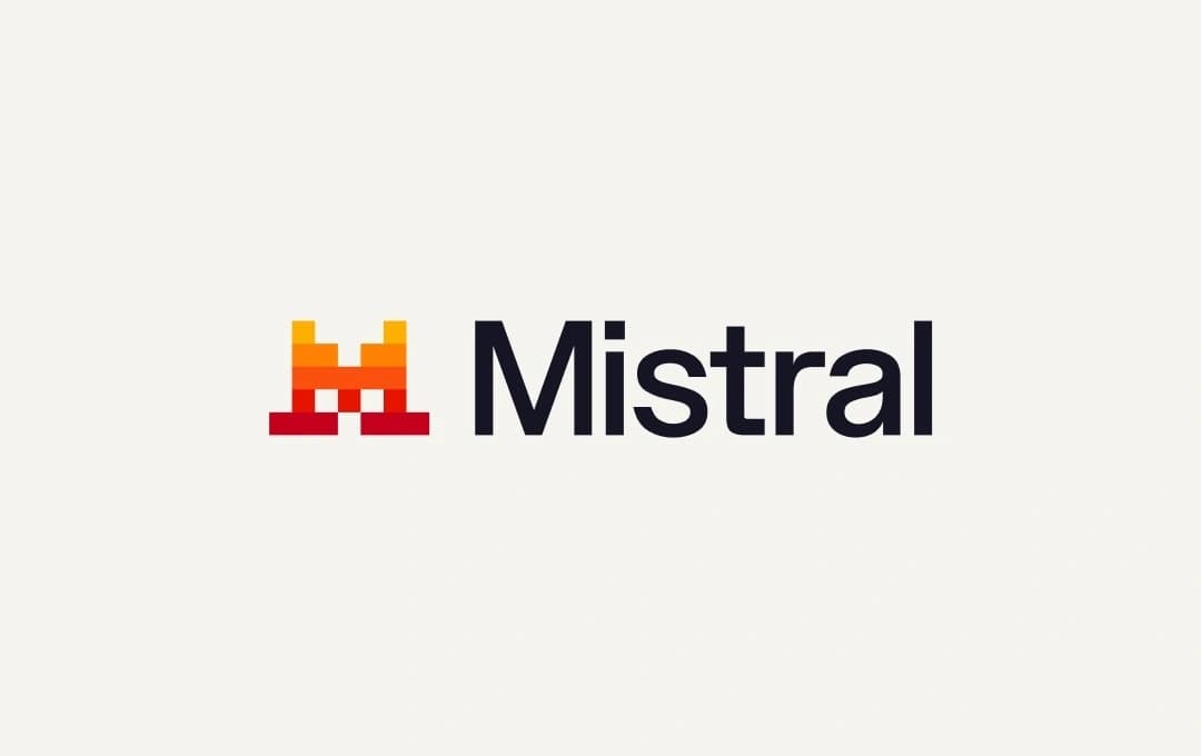 Logo officiel Mistral AI avec icône château pixel et wordmark